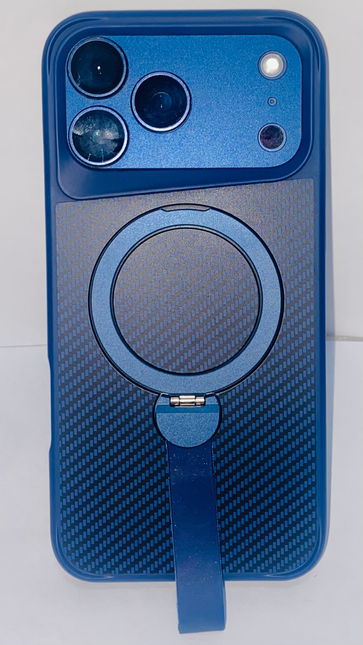 Blue Carbon Fibre iPhone 17 Pro Max case with a MagSafe ring + kickstand